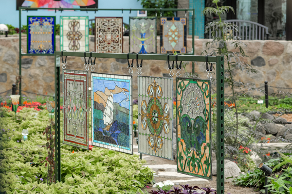 glass art installation inside flowers
