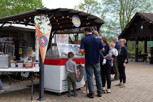 family ordering ice cream at Gift of Wings Landing Grill
